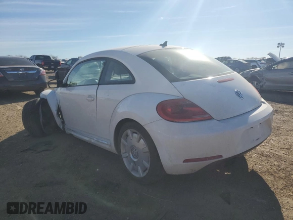 2012 Volkswagen Beetle 2.5L w/Sound/Nav PZEV with VIN 3VWJP7AT4CM657836, listed as a Copart auction lot 43065845 with 96,854 mi miles and Salvage Title. Bid and sale history available at DreamBid. Image 2.