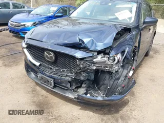 2018 Mazda CX-5 Grand Touring with VIN JM3KFBDM3J0377866, listed as a IAAI auction lot 41947014 with 70,446 mi miles. Bid and sale history available at carsss.com. Image 6.