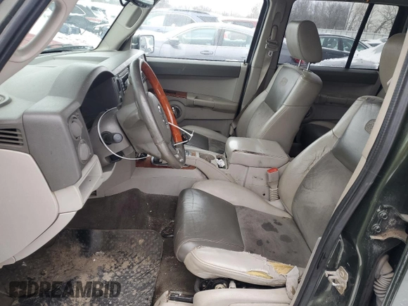 2007 Jeep Commander Overland with VIN 1J8HG68247C555994, listed as a Copart auction lot 86903914 with 219,294 mi miles and Salvage title. Bid and sale history available at DreamBid. Image 7.