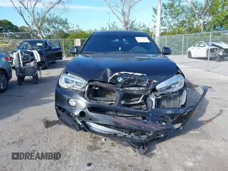 2018 BMW X6 sDrive35i with VIN 5UXKU0C5XJ0G80724, listed as a IAAI auction lot 41274338 with 122,696 mi miles. Bid and sale history available at carsss.com. Image 12.