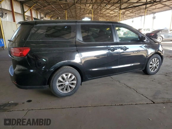2019 Kia Sedona L with VIN KNDMA5C13K6559221, listed as a Copart auction lot 85486564 with 130,248 mi miles and Salvage Title. Bid and sale history available at carsss.com. Image 3.