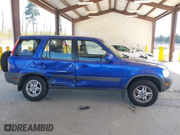 2001 Honda CR-V EX with VIN JHLRD18641C053166, listed as a IAAI auction lot 42078219 with 157,355 mi miles and . Bid and sale history available at DreamBid. Image 13.