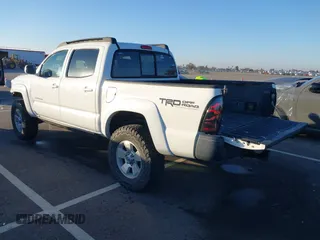 2006 Toyota Tacoma z VIN 5TELU42N66Z176139, wystawiony jako IAAI lot #41343253 z przebiegiem 145 719 mil mil oraz . Historia ofert i sprzedaży dostępna na DreamBid. Obrazek 3.