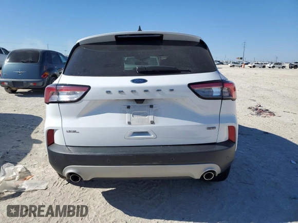 2021 Ford Escape SEL Hybrid z VIN 1FMCU0CZ5MUA52570, wystawiony jako Copart lot #42097635 z przebiegiem 105 059 mil mil oraz Czysty tytuł • Clean title. Historia ofert i sprzedaży dostępna na DreamBid. Obrazek 6.