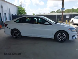 2021 Volkswagen Jetta S with VIN 3VWC57BU0MM013922, listed as a IAAI auction lot 42270877 with 36,741 mi miles and . Bid and sale history available at DreamBid. Image 13.