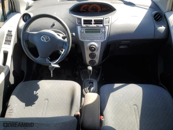 2009 Toyota Yaris with VIN JTDKT923395254782, listed as a Copart auction lot 49500505 with 164,957 mi miles and Salvage Title. Bid and sale history available at carsss.com. Image 8.