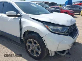2019 Honda CR-V EX with VIN 5J6RW1H5XKL008095, listed as a IAAI auction lot 41947757 with 66,752 mi miles and . Bid and sale history available at DreamBid. Image 6.