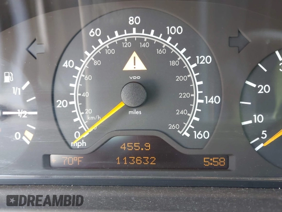 1998 Mercedes-Benz E-Class with VIN WDBJF65F5WA702626, listed as a IAAI auction lot 42014815 with 113,632 mi miles. Bid and sale history available at carsss.com. Image 7.
