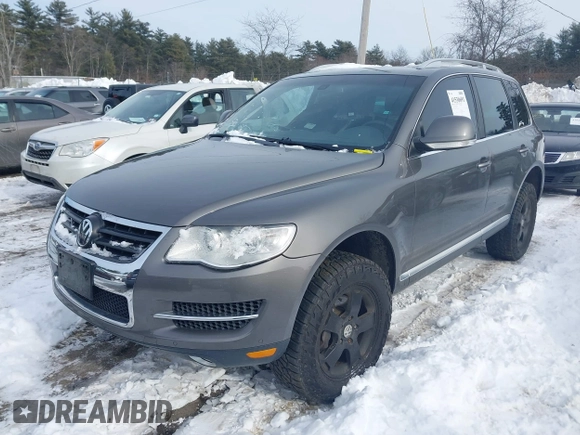 2010 Volkswagen Touareg VR6 with VIN WVGBF7A96AD004069, listed as a IAAI auction lot 41530691 with Not Provided miles and . Bid and sale history available at DreamBid. Image 2.