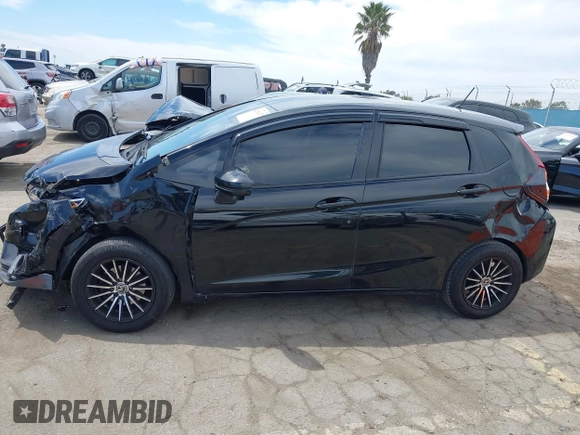 2017 Honda Fit LX with VIN JHMGK5H51HS012176, listed as a IAAI auction lot 42011477 with 91,894 mi miles. Bid and sale history available at carsss.com. Image 15.
