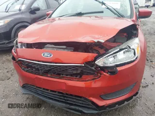 2018 Ford Focus SE with VIN 1FADP3F25JL265039, listed as a IAAI auction lot 42352050 with 140,127 mi miles and . Bid and sale history available at DreamBid. Image 6.