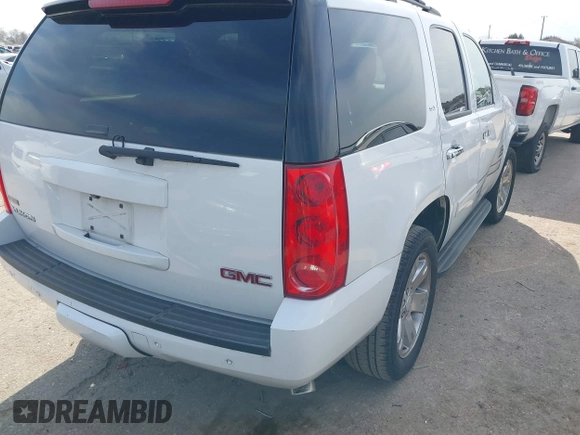 2011 GMC Yukon SLT with VIN 1GKS1CE03BR347941, listed as a IAAI auction lot 41637343 with 198,830 mi miles. Bid and sale history available at carsss.com. Image 4.