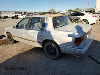 1991 Dodge Spirit z VIN 1B3XA5639MF549470, wystawiony jako Copart lot #76051284 z przebiegiem 62 309 mil mil oraz Szkody całkowita. Historia ofert i sprzedaży dostępna na DreamBid. Obrazek 2.