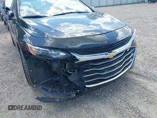 2025 Chevrolet Malibu LT with VIN 1G1ZD5STXSF130988, listed as a IAAI auction lot 42078943 with 14,048 mi miles and . Bid and sale history available at DreamBid. Image 6.