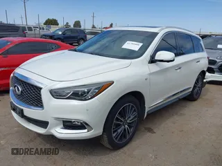 2019 Infiniti QX60 LUXE with VIN 5N1DL0MN5KC503552, listed as a IAAI auction lot 41780408 with 73,148 mi miles. Bid and sale history available at carsss.com. Image 18.