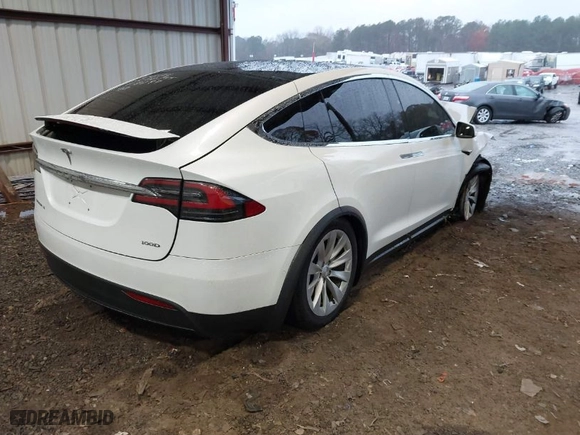 2018 Tesla Model X 75D with VIN 5YJXCBE24JF138297, listed as a IAAI auction lot 41058224 with NaN miles. Bid and sale history available at carsss.com. Image 4.
