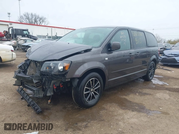 2014 Dodge Grand Caravan SXT with VIN 2C4RDGCG0ER406080, listed as a IAAI auction lot 42023530 with 183,212 mi miles and . Bid and sale history available at DreamBid. Image 2.