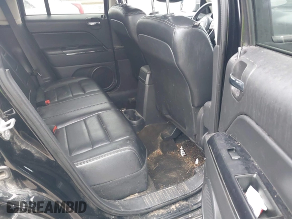 2014 Jeep Patriot Limited with VIN 1C4NJRCB7ED569805, listed as a IAAI auction lot 40854840 with 189,858 mi miles. Bid and sale history available at carsss.com. Image 8.