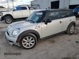 2014 MINI Clubman S z VIN WMWZG3C52ETY33460, wystawiony jako Copart lot #82752834 z przebiegiem 130 015 mil mil oraz Szkoda całkowita • Salvage title. Historia ofert i sprzedaży dostępna na DreamBid. Obrazek 1.