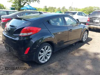 2013 Hyundai Veloster w/Black Int with VIN KMHTC6AD2DU120059, listed as a IAAI auction lot 42355902 with 81,221 mi miles and . Bid and sale history available at DreamBid. Image 4.
