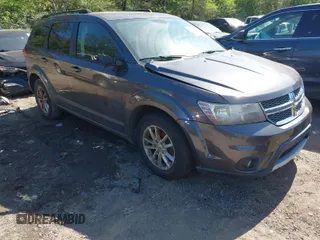 2017 Dodge Journey SXT z VIN 3C4PDDBG4HT555004, wystawiony jako IAAI lot #42007689 z przebiegiem 190 367 mil mil oraz . Historia ofert i sprzedaży dostępna na DreamBid. Obrazek 1.