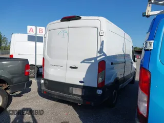 2019 Ford Transit with VIN 1FTYE2CM7KKB76498, listed as a IAAI auction lot 41969392 with 180,444 mi miles and . Bid and sale history available at carsss.com. Image 4.