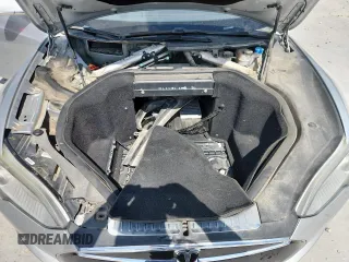2013 Tesla Model S with VIN 5YJSA1CG5DFP03704, listed as a Copart auction lot 65143565 with Not provided miles and Clean title. Bid and sale history available at DreamBid. Image 11.