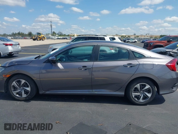 2020 Honda Civic LX with VIN 19XFC2F68LE007735, listed as a IAAI auction lot 42215294 with 3,849 mi miles and . Bid and sale history available at DreamBid. Image 14.