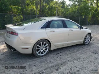 2015 Lincoln MKZ z VIN 3LN6L2JK4FR629312, wystawiony jako Copart lot #60230405 z przebiegiem 79 570 mil mil oraz Szkoda całkowita • Salvage title. Historia ofert i sprzedaży dostępna na DreamBid. Obrazek 3.