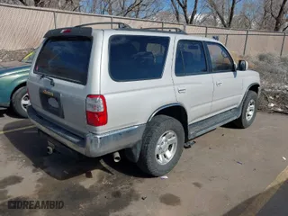 1998 Toyota 4Runner SR5 with VIN JT3HN86R5W0192618, listed as a IAAI auction lot 41643377 with 107,006 mi miles. Bid and sale history available at carsss.com. Image 4.