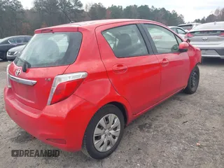 2013 Toyota Yaris L with VIN JTDKTUD32DD554425, listed as a IAAI auction lot 40961115 with 1 mi miles. Bid and sale history available at carsss.com. Image 4.