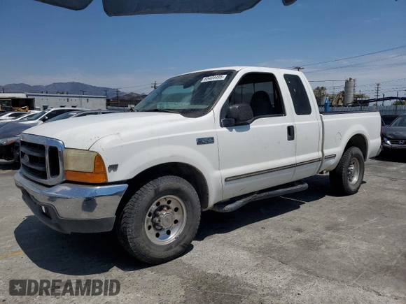 1999 Ford F-250 XL with VIN 1FTNX20L8XEB01923, listed as a Copart auction lot 65404495 with 383,297 mi miles and Salvage title. Bid and sale history available at DreamBid. Image 1.