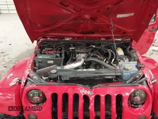 2011 Jeep Wrangler Sahara with VIN 1J4AA5D10BL593534, listed as a IAAI auction lot 41551416 with 101,716 mi miles and . Bid and sale history available at DreamBid. Image 10.
