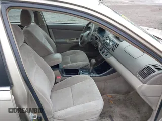 2004 Toyota Camry LE with VIN 4T1BE30KX4U327013, listed as a IAAI auction lot 41987105 with 241,236 mi miles. Bid and sale history available at carsss.com. Image 5.