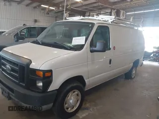 2010 Ford Econoline Cargo Commercial with VIN 1FTNE2EL7ADA74595, listed as a IAAI auction lot 42512878 with 154,412 mi miles and . Bid and sale history available at DreamBid. Image 2.