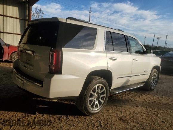 2019 GMC Yukon Denali with VIN 1GKS1CKJ7KR370524, listed as a Copart auction lot 77344394 with 39,753 mi miles and Salvage Title. Bid and sale history available at carsss.com. Image 3.