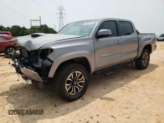 2021 Toyota Tacoma SR5 z VIN 5TFAZ5CN2MX099562, wystawiony jako Copart lot #59329335 z przebiegiem 23 570 mil mil oraz Czysty tytuł • Clean title. Historia ofert i sprzedaży dostępna na DreamBid. Obrazek 1.