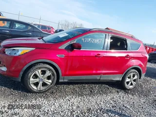 2014 Ford Escape SE with VIN 1FMCU9G90EUD71021, listed as a IAAI auction lot 42052487 with 154,811 mi miles and . Bid and sale history available at DreamBid. Image 15.