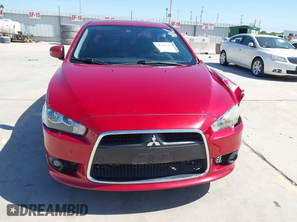 2015 Mitsubishi Lancer GT with VIN JA32U8FW9FU014308, listed as a IAAI auction lot 41982416 with 227,574 mi miles. Bid and sale history available at carsss.com. Image 12.