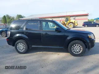 2010 Mercury Mariner Premier with VIN 4M2CN9H74AKJ16743, listed as a IAAI auction lot 42245447 with 160,203 mi miles and . Bid and sale history available at DreamBid. Image 14.