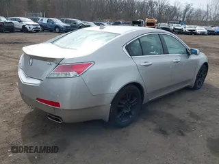 2009 Acura TL Tech with VIN 19UUA86519A013039, listed as a IAAI auction lot 41656570 with 241,217 mi miles. Bid and sale history available at carsss.com. Image 4.