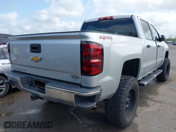 2014 Chevrolet Silverado 1500 LT with VIN 3GCUKREC3EG456385, listed as a IAAI auction lot 41931312 with 62,616 mi miles and . Bid and sale history available at DreamBid. Image 4.