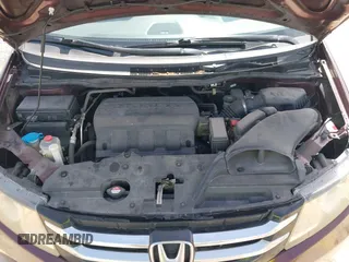 2015 Honda Odyssey EX-L z VIN 5FNRL5H66FB083559, wystawiony jako IAAI lot #41691937 z przebiegiem 101 530 mil mil oraz . Historia ofert i sprzedaży dostępna na DreamBid. Obrazek 10.