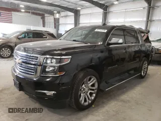 2019 Chevrolet Suburban Premier with VIN 1GNSKJKJ8KR302849, listed as a Copart auction lot 87717275 with 69,498 mi miles and Salvage Title. Bid and sale history available at DreamBid. Image 1.