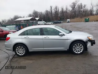 2011 Chrysler 200 Touring with VIN 1C3BC1FB8BN531262, listed as a IAAI auction lot 41673308 with 107,931 mi miles. Bid and sale history available at carsss.com. Image 13.