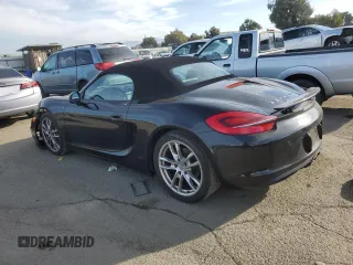 2014 Porsche Boxster with VIN WP0CA2A84ES121667, listed as a Copart auction lot 87510945 with 62,689 mi miles and Salvage title. Bid and sale history available at DreamBid. Image 2.