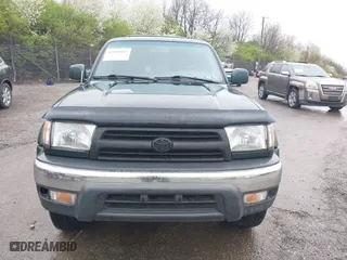 2000 Toyota 4Runner SR5 with VIN JT3HN86R9Y0294975, listed as a IAAI auction lot 41985007 with 218,761 mi miles. Bid and sale history available at carsss.com. Image 6.