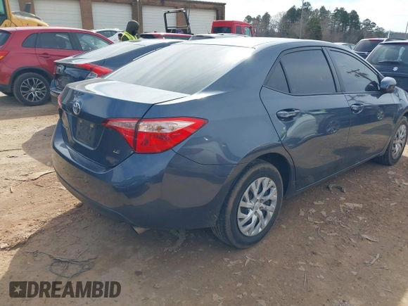 2018 Toyota Corolla L with VIN 5YFBURHE8JP807522, listed as a IAAI auction lot 41609439 with 76,573 mi miles and . Bid and sale history available at DreamBid. Image 4.