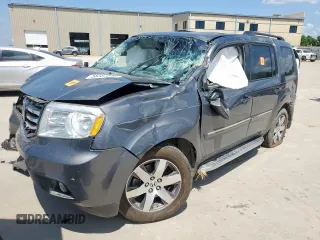 2013 Honda Pilot Touring z VIN 5FNYF3H97DB032389, wystawiony jako Copart lot #58387645 z przebiegiem Nie podano mil oraz Szkoda całkowita • Salvage title. Historia ofert i sprzedaży dostępna na DreamBid. Obrazek 1.