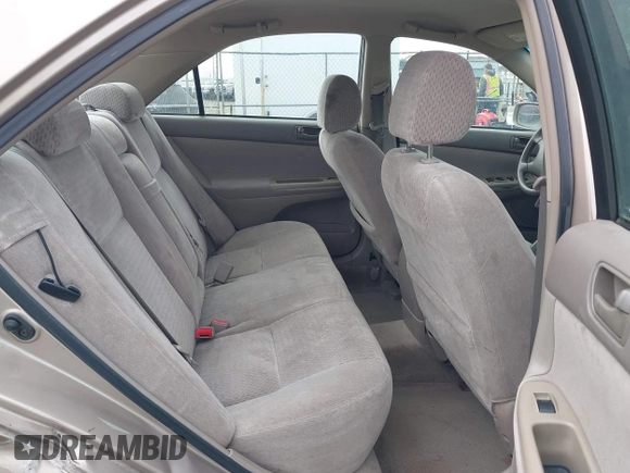 2002 Toyota Camry LE z VIN 4T1BE32K72U028489, wystawiony jako IAAI lot #41760604 z przebiegiem 163 950 mil mil oraz . Historia ofert i sprzedaży dostępna na DreamBid. Obrazek 8.